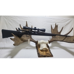 700 ADL 7MM REM Pre-Owned Remington 700 ADL Blued Matte Black Bolt Action Rifle - 7mm Remington Magnum - 26in-Comes with 3-9x40 scope with rings